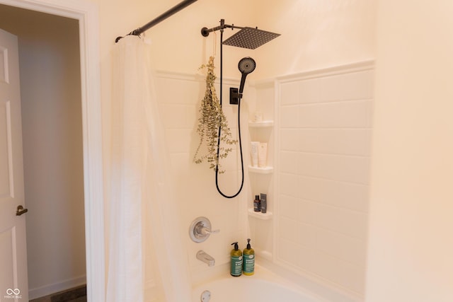 full bathroom with shower / bath combo with shower curtain