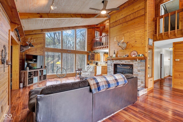 10495 Deer Run Rd, Poland, IN 47868 - living room with wooden walls, a high ceiling, and ceiling fan
