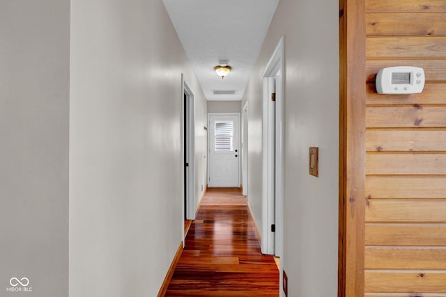 10495 Deer Run Rd, Poland, IN 47868 - hallway featuring wood finished floors, visible vents, and baseboards