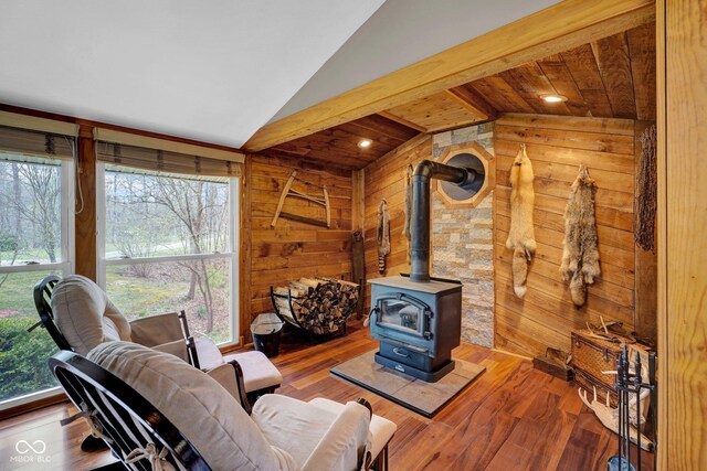 10495 Deer Run Rd, Poland, IN 47868 - living area with wooden walls, wood finished floors, a wealth of natural light, and vaulted ceiling