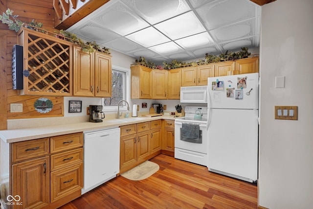10495 Deer Run Rd, Poland, IN 47868 - kitchen with light wood finished floors, a sink, white appliances, and light countertops