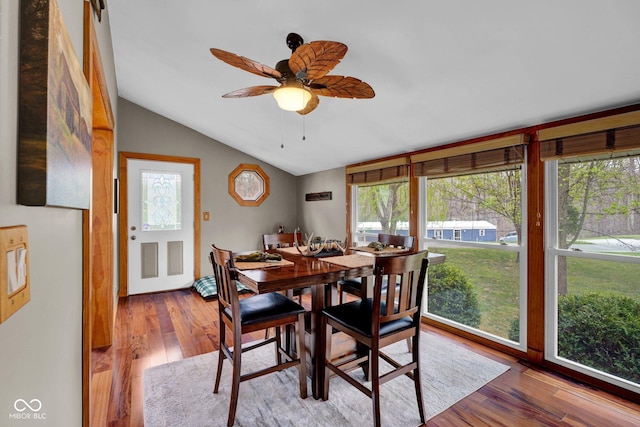 10495 Deer Run Rd, Poland, IN 47868 - dining space with lofted ceiling, a ceiling fan, and wood finished floors