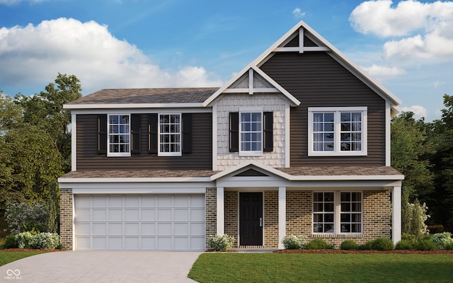 view of front facade with an attached garage, driveway, a front yard, and brick siding
