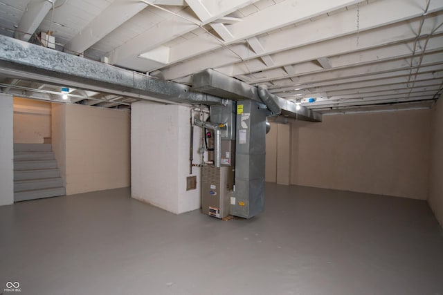 3140 Bonham Dr, Indianapolis, IN 46222 - finished basement featuring heating unit and stairway