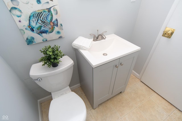 3140 Bonham Dr, Indianapolis, IN 46222 - bathroom featuring toilet, vanity, and tile patterned flooring