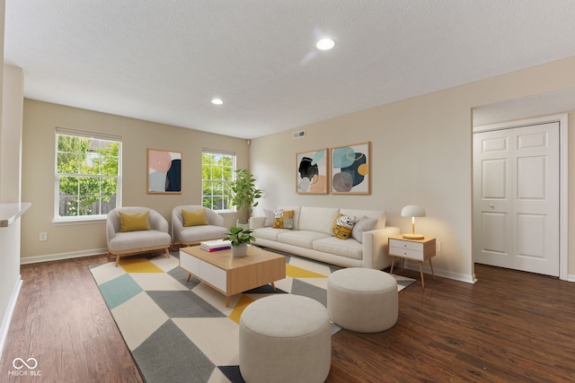 518 Carthage Cir, Westfield, IN 46074 - living area with dark wood-type flooring, baseboards, a textured ceiling, and recessed lighting