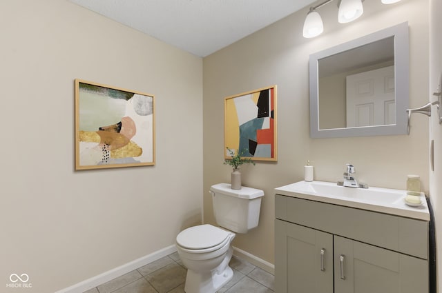 518 Carthage Cir, Westfield, IN 46074 - bathroom featuring tile patterned flooring, baseboards, vanity, and toilet