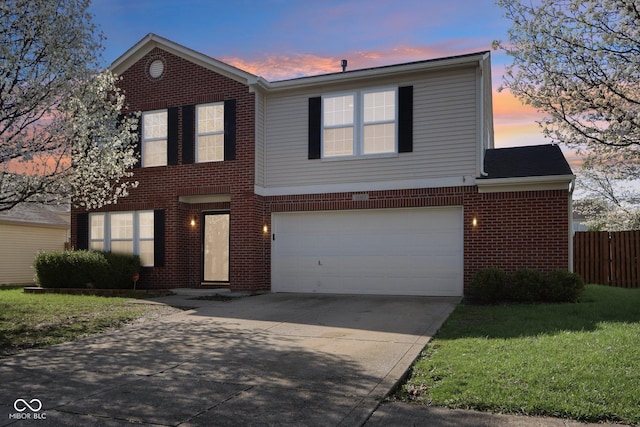 10303 Memorial Knoll Dr, Indianapolis, IN 46234 - traditional home with brick siding, driveway, fence, and an attached garage