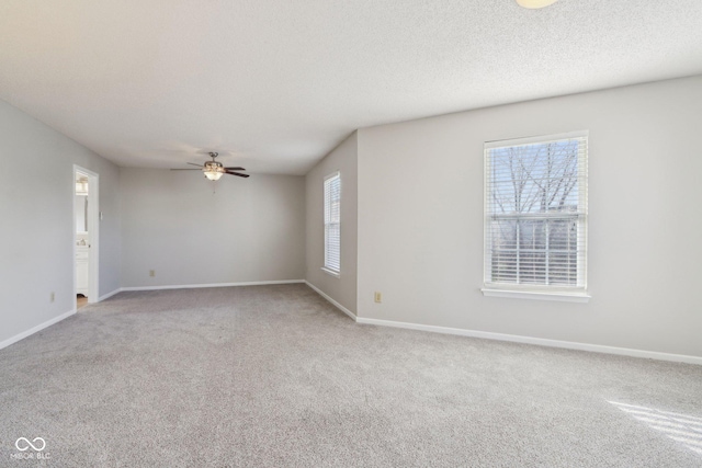 10303 Memorial Knoll Dr, Indianapolis, IN 46234 - unfurnished room featuring plenty of natural light, a ceiling fan, and carpet floors