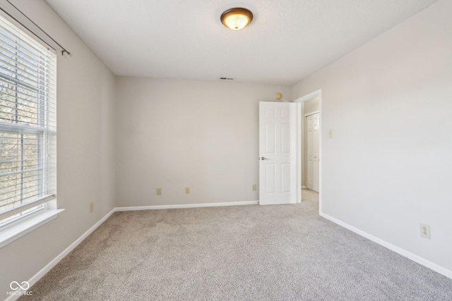 10303 Memorial Knoll Dr, Indianapolis, IN 46234 - spare room featuring visible vents, baseboards, and carpet floors