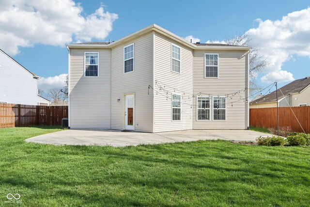 10303 Memorial Knoll Dr, Indianapolis, IN 46234 - rear view of property with central air condition unit, a patio, a yard, and a fenced backyard