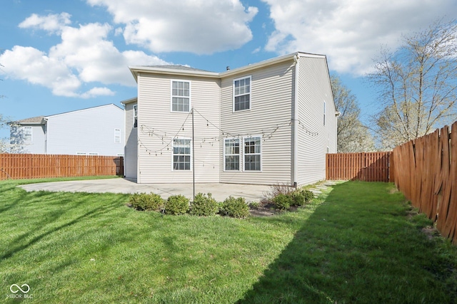 10303 Memorial Knoll Dr, Indianapolis, IN 46234 - rear view of house featuring a patio area, a fenced backyard, and a lawn
