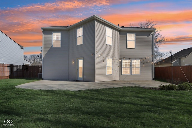 10303 Memorial Knoll Dr, Indianapolis, IN 46234 - rear view of property featuring a patio area, a fenced backyard, and a lawn