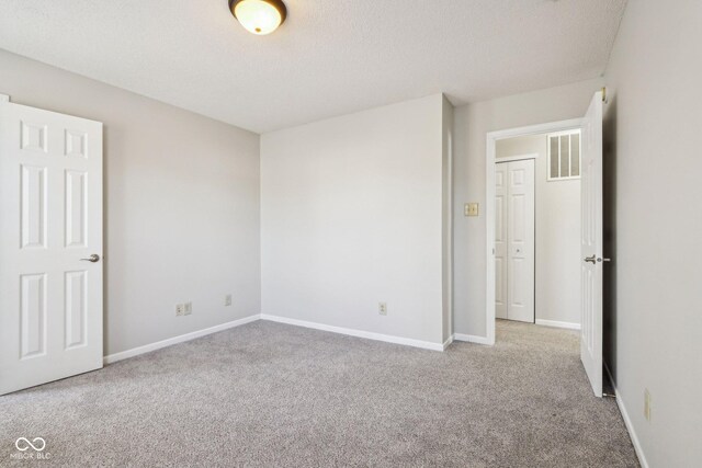 10303 Memorial Knoll Dr, Indianapolis, IN 46234 - unfurnished bedroom with baseboards, visible vents, and carpet floors