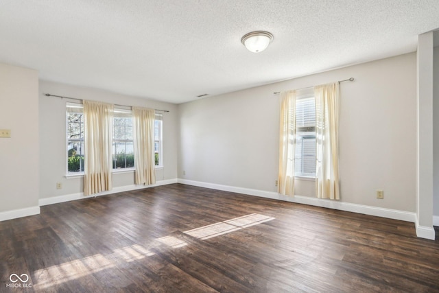 10303 Memorial Knoll Dr, Indianapolis, IN 46234 - unfurnished room featuring visible vents, baseboards, a textured ceiling, and wood finished floors