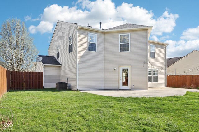10303 Memorial Knoll Dr, Indianapolis, IN 46234 - back of house with a patio, central AC unit, a fenced backyard, and a lawn