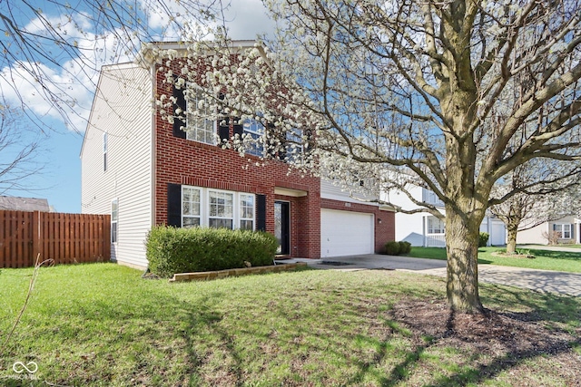 10303 Memorial Knoll Dr, Indianapolis, IN 46234 - view of front of property featuring a garage, a front yard, fence, brick siding, and driveway