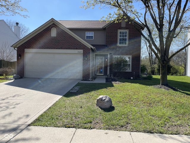 traditional-style house featuring a front yard, brick siding, driveway, and an attached garage