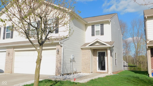 1139 Topp Creek Dr, Indianapolis, IN 46214 - traditional home with a garage, concrete driveway, roof with shingles, and a front lawn