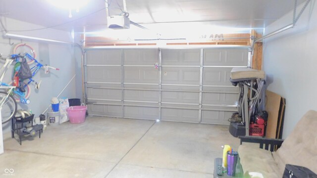 1139 Topp Creek Dr, Indianapolis, IN 46214 - garage featuring a garage door opener