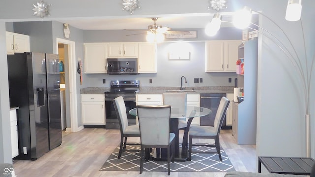 1139 Topp Creek Dr, Indianapolis, IN 46214 - kitchen featuring appliances with stainless steel finishes and white cabinetry