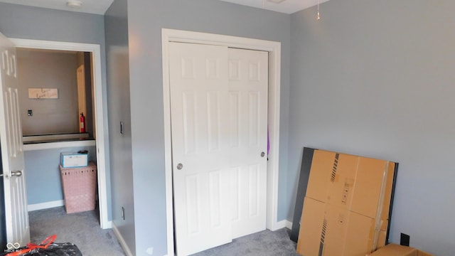 1139 Topp Creek Dr, Indianapolis, IN 46214 - unfurnished bedroom featuring carpet, a closet, and baseboards