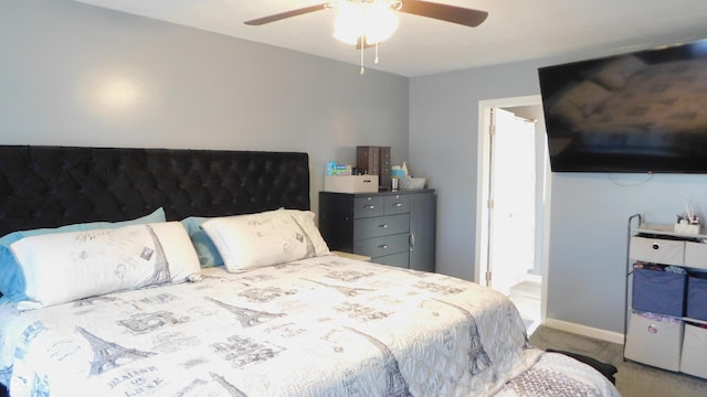 1139 Topp Creek Dr, Indianapolis, IN 46214 - bedroom featuring carpet floors, a ceiling fan, connected bathroom, and baseboards