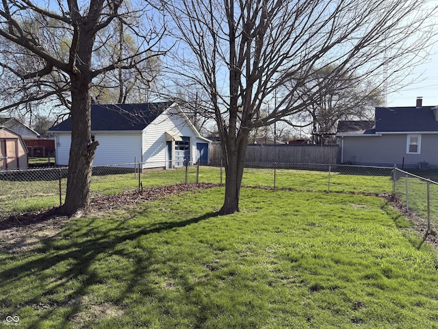 1804 W 15th St, Muncie, IN 47302 - view of yard featuring an outbuilding and fence