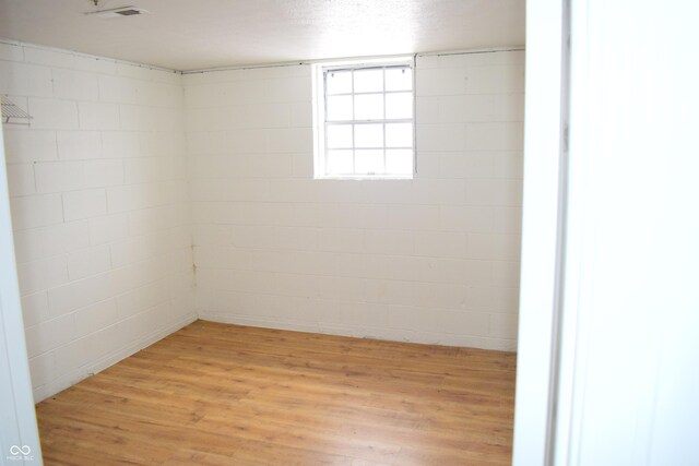 4107 Eisenhower Dr, Indianapolis, IN 46254 - empty room featuring light wood finished floors and visible vents