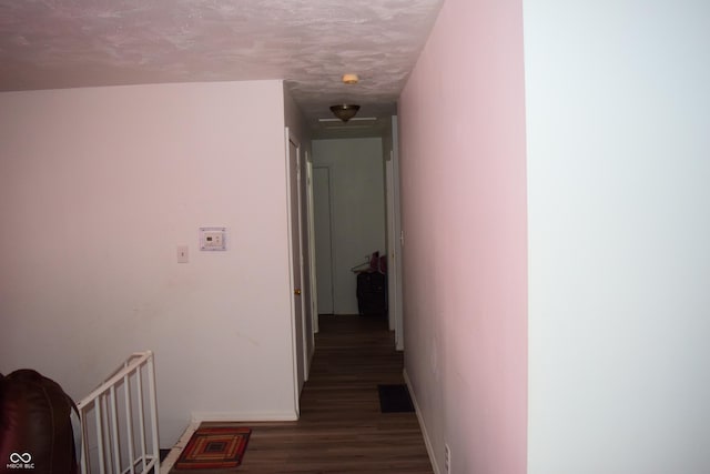 4107 Eisenhower Dr, Indianapolis, IN 46254 - corridor featuring baseboards and wood finished floors