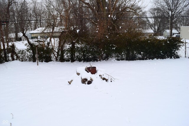 4107 Eisenhower Dr, Indianapolis, IN 46254 - view of snowy yard