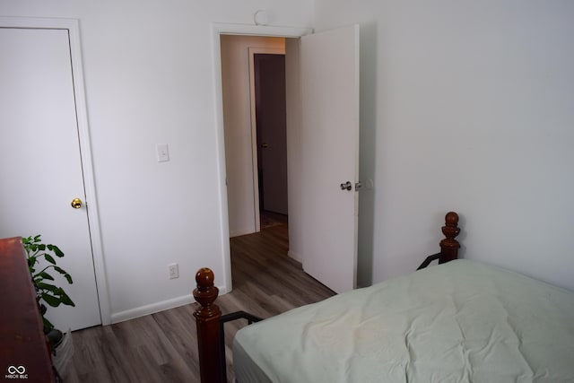 4107 Eisenhower Dr, Indianapolis, IN 46254 - bedroom with wood finished floors and baseboards