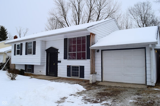4107 Eisenhower Dr, Indianapolis, IN 46254 - bi-level home with a garage