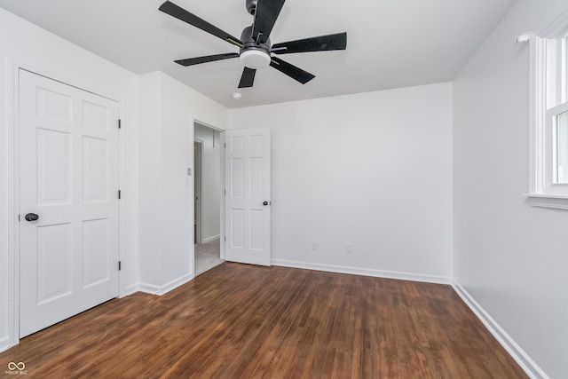 4106 Armon Ct, Carmel, IN 46033 - unfurnished bedroom with wood finished floors, baseboards, and a ceiling fan