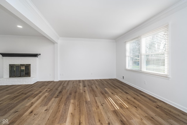 4106 Armon Ct, Carmel, IN 46033 - unfurnished living room featuring crown molding, wood finished floors, a fireplace, and baseboards