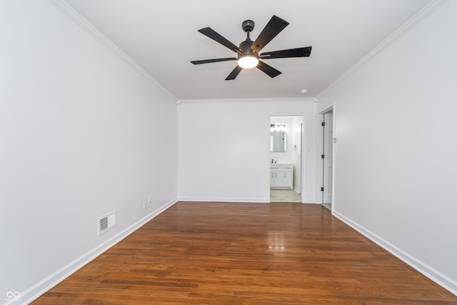 4106 Armon Ct, Carmel, IN 46033 - spare room featuring baseboards, ornamental molding, visible vents, ceiling fan, and wood finished floors