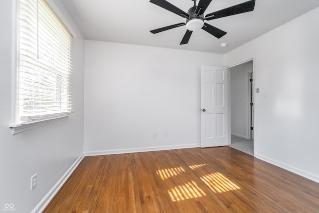 4106 Armon Ct, Carmel, IN 46033 - empty room with a wealth of natural light, wood finished floors, and baseboards