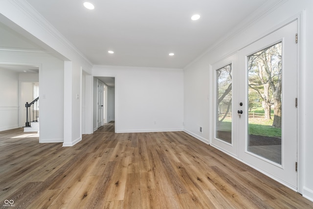 4106 Armon Ct, Carmel, IN 46033 - unfurnished living room featuring recessed lighting, plenty of natural light, baseboards, and wood finished floors