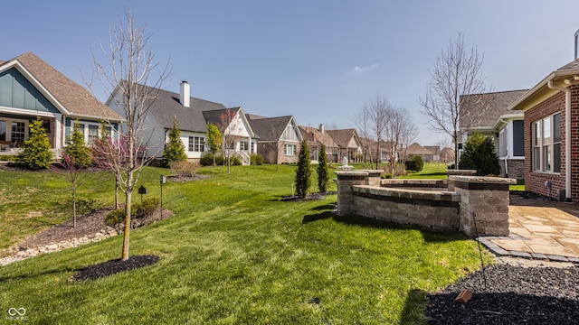 528 Dylan Dr, Carmel, IN 46032 - view of green lawn featuring a residential view