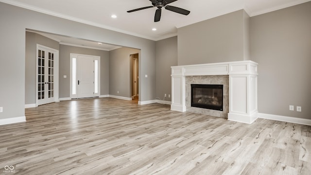 528 Dylan Dr, Carmel, IN 46032 - unfurnished living room with a ceiling fan, light wood finished floors, recessed lighting, baseboards, and a fireplace