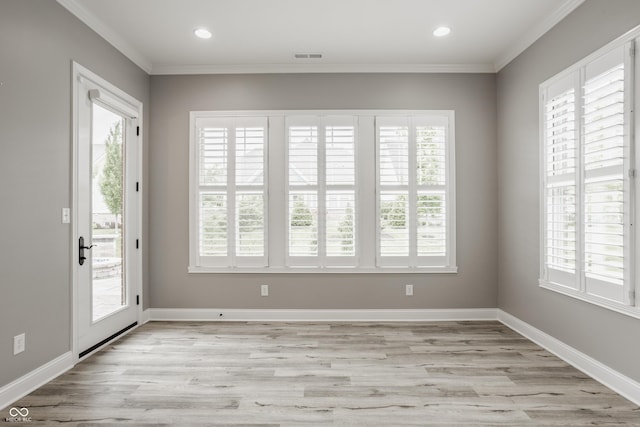 528 Dylan Dr, Carmel, IN 46032 - unfurnished room with healthy amount of natural light, ornamental molding, light wood-type flooring, recessed lighting, and baseboards