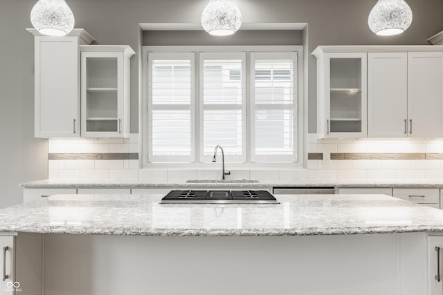 528 Dylan Dr, Carmel, IN 46032 - kitchen featuring a sink, white cabinets, and tasteful backsplash