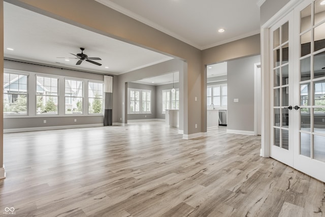 528 Dylan Dr, Carmel, IN 46032 - unfurnished living room with french doors, crown molding, recessed lighting, a ceiling fan, and light wood finished floors