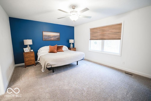 8917 N Old State Road 37, Bloomington, IN 47408 - carpeted bedroom featuring baseboards, a ceiling fan, and visible vents
