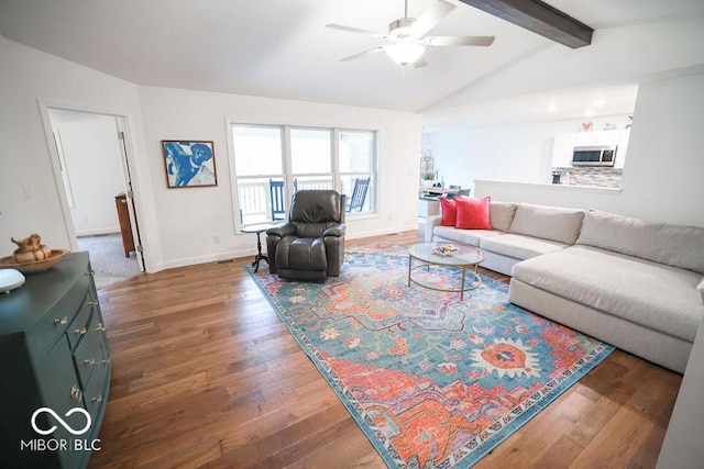 8917 N Old State Road 37, Bloomington, IN 47408 - living area featuring baseboards, lofted ceiling with beams, visible vents, ceiling fan, and wood finished floors