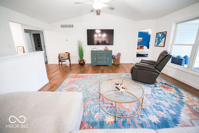 8917 N Old State Road 37, Bloomington, IN 47408 - living room featuring visible vents, ceiling fan, vaulted ceiling, and wood finished floors