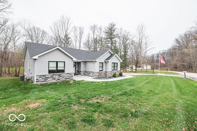 8917 N Old State Road 37, Bloomington, IN 47408 - view of front of home with central AC, a front lawn, stone siding, and a shingled roof