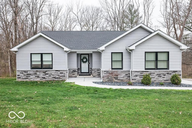 8917 N Old State Road 37, Bloomington, IN 47408 - view of front facade featuring roof with shingles, stone siding, and a front lawn
