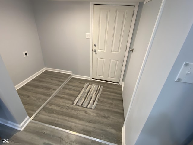1546 Kappes St, Indianapolis, IN 46221 - interior space featuring laundry area, wood finished floors, hookup for an electric dryer, and baseboards
