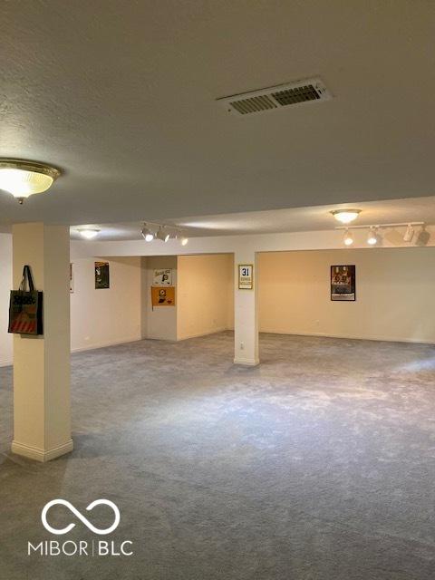 3504 Inverness Blvd, Carmel, IN 46032 - finished below grade area featuring track lighting and carpet floors